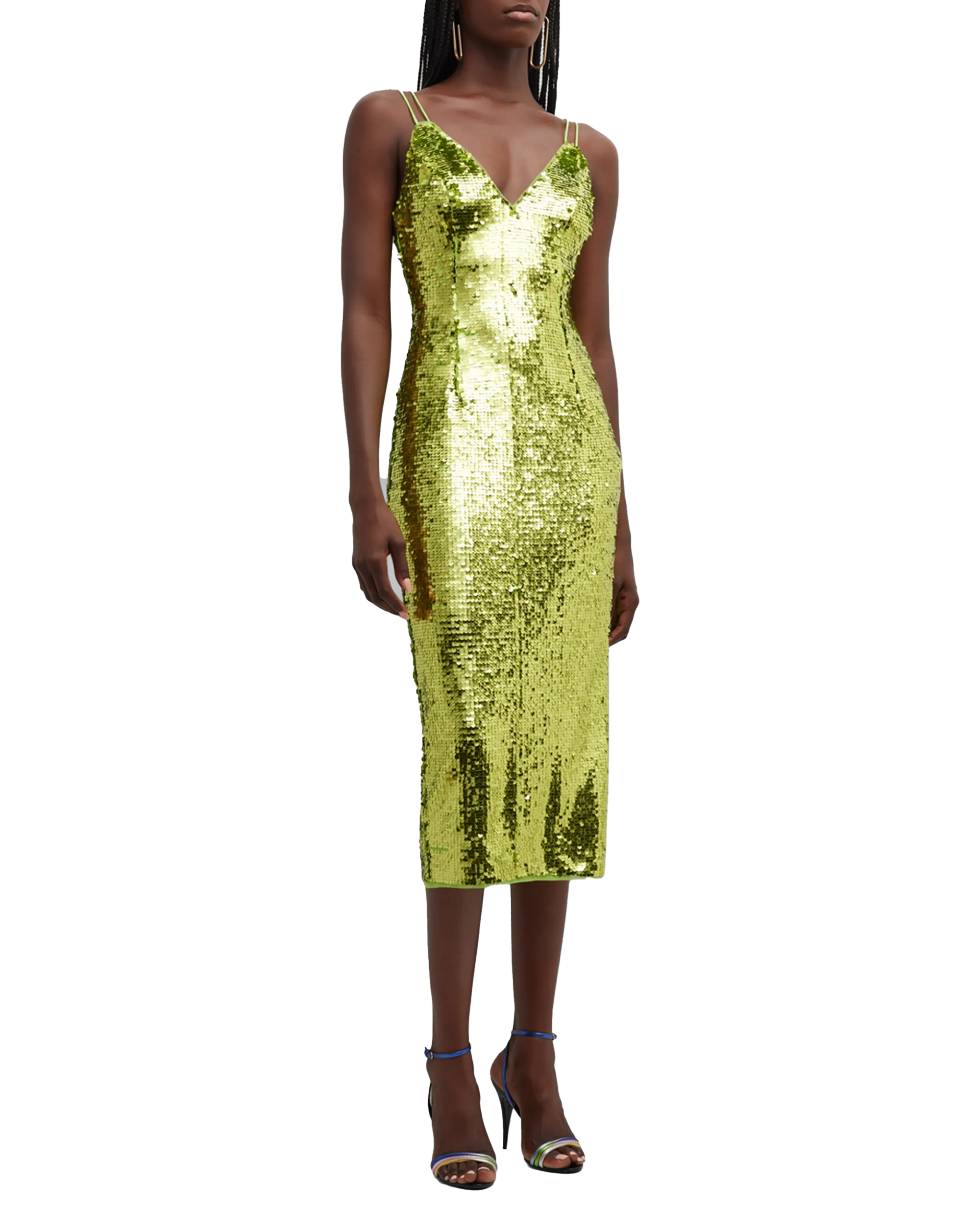 Ein Model in einem glitzernden grünen Kleid