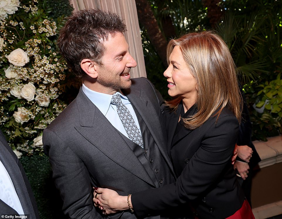 Jennifer hugged Bradley Cooper inside