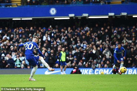LONDON, ENGLAND - JANUARY 13: Cole Palmer of Chelsea scores their sides first goal from the penalty spot during the Premier League match between Chelsea FC and Fulham FC at Stamford Bridge on January 13, 2024 in London, England. (Photo by Harriet Lander - Chelsea FC/Chelsea FC via Getty Images)