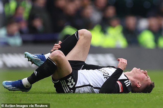 Soccer Football - Premier League - Chelsea v Fulham - Stamford Bridge, London, Britain - January 13, 2024 Fulham's Harry Wilson reacts after sustaining an injury Action Images via Reuters/Paul Childs NO USE WITH UNAUTHORIZED AUDIO, VIDEO, DATA, FIXTURE LISTS, CLUB/LEAGUE LOGOS OR 'LIVE' SERVICES. ONLINE IN-MATCH USE LIMITED TO 45 IMAGES, NO VIDEO EMULATION. NO USE IN BETTING, GAMES OR SINGLE CLUB/LEAGUE/PLAYER PUBLICATIONS.