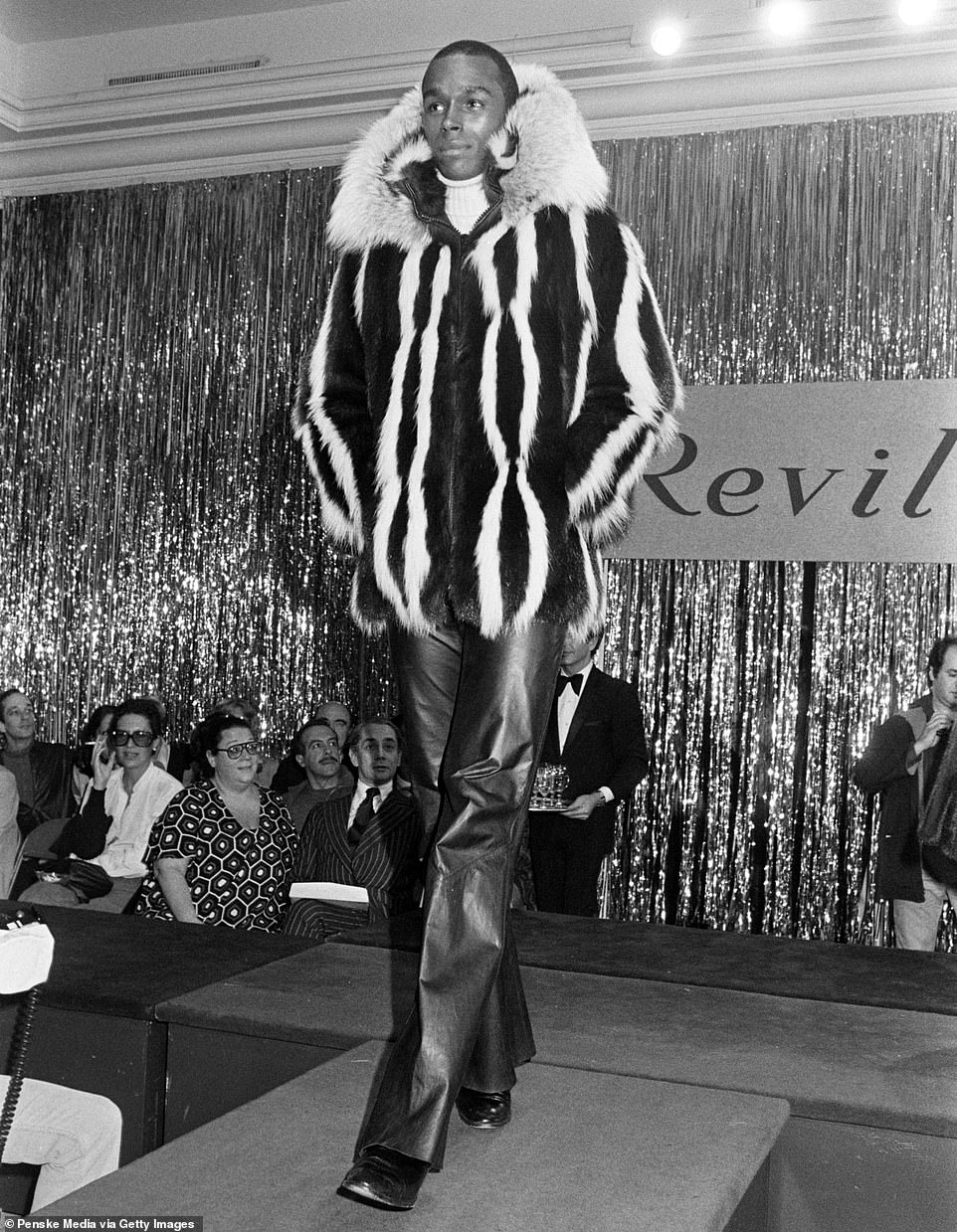 Well-aware of his dazzling looks and charisma, Sterling - seen here on a Revillon Furs runway in 1976 - relished the attention, and attracted men and women alike