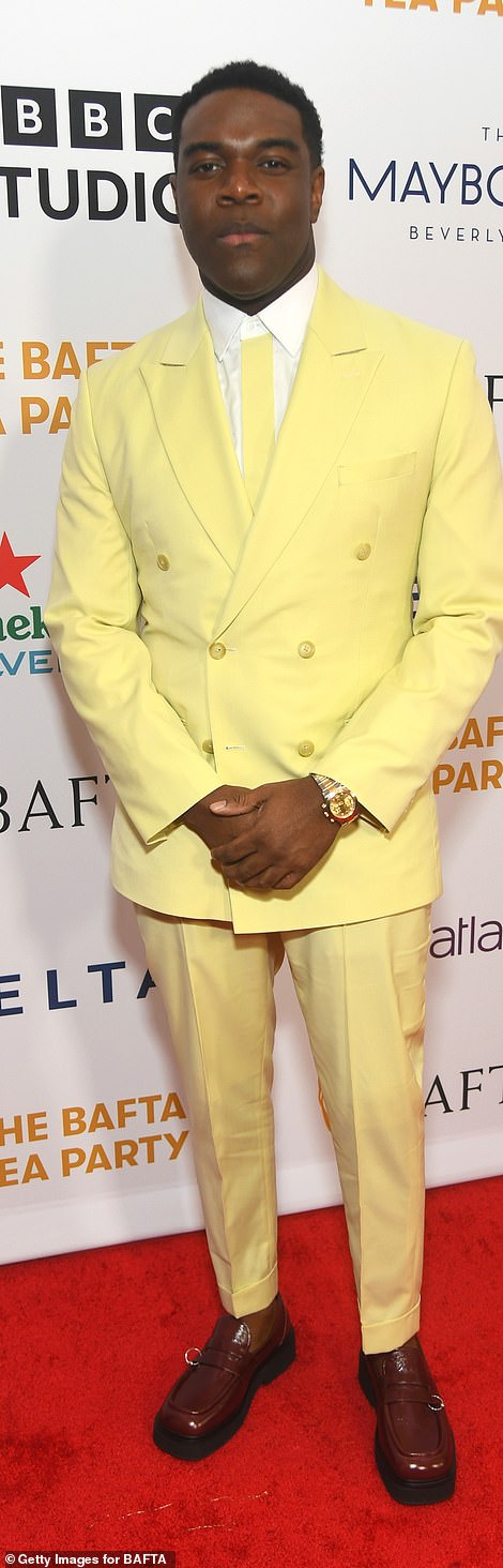 Sam Richardson was dapper in a pastel yellow suit and slipped into a pair of sleek, dark brown loafers