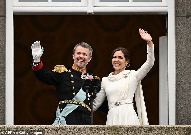 Mary was all smiles with an elated Frederik as the pair posed up a storm for adoring crowds on the balcony