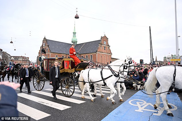 The Queen appeared in high spirits as she rode in the carriage and waved to delighted crowds in the streets
