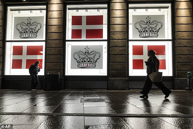 Department store windows display the Danish flag and the Danish crown in Copenhagen