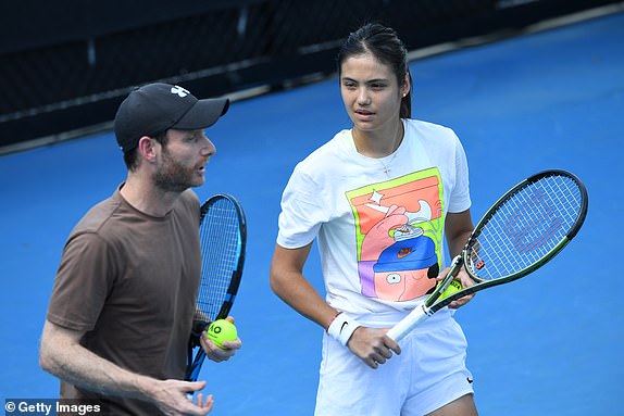 MELBOURNE, AUSTRALIA - JANUARY 16: Emma Raducanu of Great Britain talking with her coach Nick Cavaday t before her round one game against Shelby Rogers of the United States during the 2024 Australian Open at Melbourne Park on January 16, 2024 in Melbourne, Australia. (Photo by James D. Morgan/Getty Images)