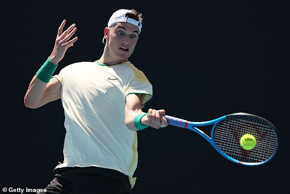 MELBOURNE, AUSTRALIA - JANUARY 16: Jack Draper of Great Britain plays a forehand in their round one singles match against Marcos Giron of the United States during the 2024 Australian Open at Melbourne Park on January 16, 2024 in Melbourne, Australia. (Photo by Julian Finney/Getty Images)