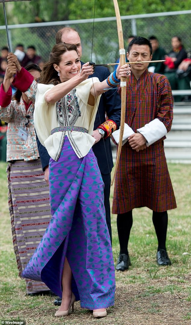 Kate takes part in archery at Thimphu's open-air archery venue on April 14, 2016 in Thimphu, Bhutan