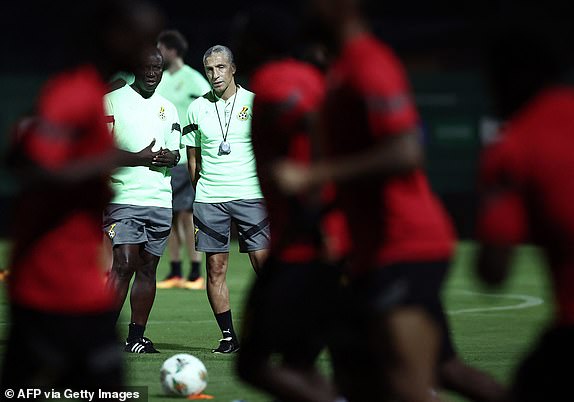 Ghana's English head coach Chris Hughton (C) looks as his players during a training session at Jardin Botanique stadium in Bingerville, Abidjan, on January 17, 2024, on the eve of the 2024 Africa Cup of Nations (CAN) football match between Egypt and Ghana. (Photo by FRANCK FIFE / AFP) (Photo by FRANCK FIFE/AFP via Getty Images)