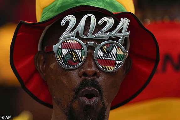 A fan of Ghana cheers prior to the start of the African Cup of Nations Group B soccer match between Egypt and Ghana in Abidjan, Ivory Coast, Thursday, Jan.18, 2024. (AP Photo/Themba Hadebe)