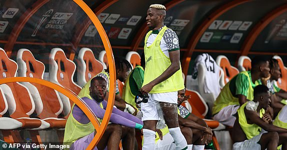Nigeria's forward #9 Victor Osimhen (C) reacts after leaving the pitch during the Africa Cup of Nations (CAN) 2024 group A football match between Ivory Coast and Nigeria at the Alassane Ouattara Olympic Stadium in Ebimpe, Abidjan, on January 18, 2024. (Photo by FRANCK FIFE / AFP) (Photo by FRANCK FIFE/AFP via Getty Images)