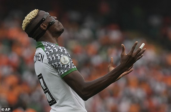 Nigeria's Victor Osimhen reacts during the African Cup of Nations Group A soccer match between Ivory Coast v Nigeria at the Olympic Stadium of Ebimpe, Abidjan, Ivory Coast, Thursday, Jan. 18, 2024. (AP Photo/Sunday Alamba)