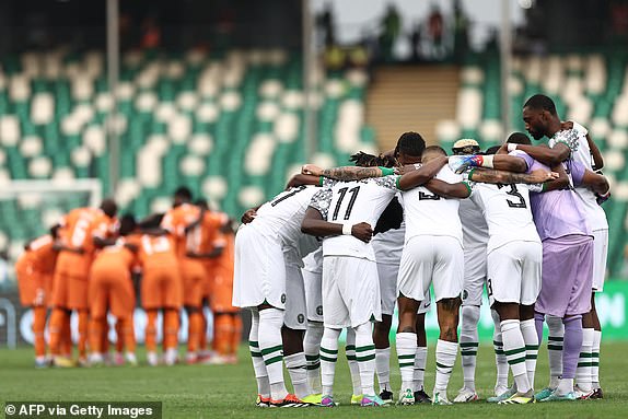 Players gather ahead of the Africa Cup of Nations (CAN) 2024 group A football match between Ivory Coast and Nigeria at the Alassane Ouattara Olympic Stadium in Ebimpe, Abidjan, on January 18, 2024. (Photo by FRANCK FIFE / AFP) (Photo by FRANCK FIFE/AFP via Getty Images)