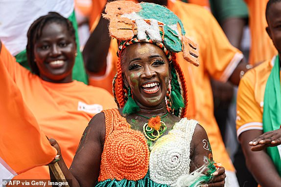 An Ivory Coast's supporter reacts ahead of the Africa Cup of Nations (CAN) 2024 group A football match between Ivory Coast and Nigeria at the Alassane Ouattara Olympic Stadium in Ebimpe, Abidjan, on January 18, 2024. (Photo by FRANCK FIFE / AFP) (Photo by FRANCK FIFE/AFP via Getty Images)