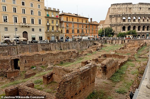 The Ludus Magnus in Rome is a massive archaeological site where gladiators trained. Pictured are its remains with the Colosseum in the background