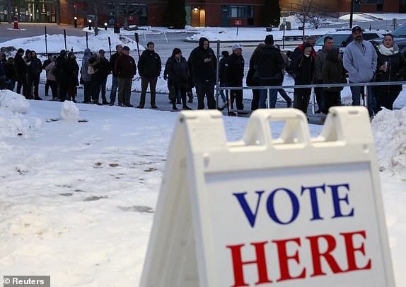 People line up to vote during the 2024 Republican presidential primary, at Pinkerton Academy in Derry, New Hampshire, U.S., January 23, 2024. REUTERS/Reba Saldanha