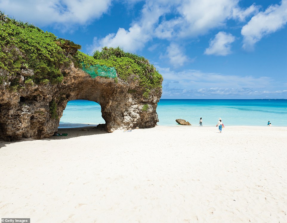 SUNAYAMA BEACH, MIYAKOJIMA ISLAND, OKINAWA, JAPAN: 'Snow-white sands and a dramatic arch' helped this beach earn a place in Lonely Planet's top 100 ranking