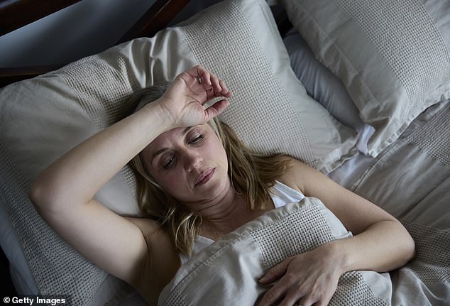 MICHAEL MOSLEY: The more time you spend in bed, the more time you spend lying awake, ruminating and worrying about how tired you¿re going to feel the next day (stock image)