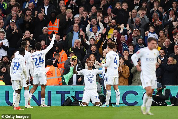 LEEDS, ENGLAND - JANUARY 27: Jaidon Anthony of Leeds United celebrates scoring his team's first goal whilst displaying a t-shirt reading 'est in perfect peace mum' during the Emirates FA Cup Fourth Round match between Leeds United and Plymouth Argyle at Elland Road on January 27, 2024 in Leeds, England. (Photo by Matt McNulty/Getty Images)