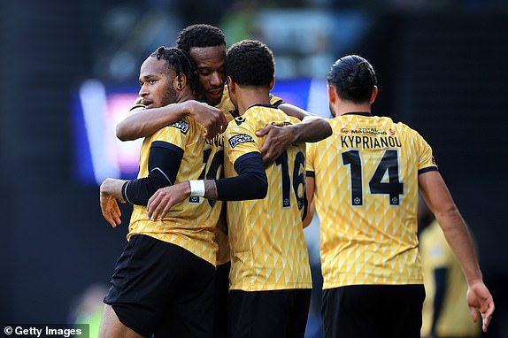 IPSWICH, ENGLAND - JANUARY 27: Lamar Reynolds of Maidstone United celebrates with teammates after scoring his team's first goal during the Emirates FA Cup Fourth Round match between Ipswich Town and Maidstone United at Portman Road on January 27, 2024 in Ipswich, England. (Photo by Stephen Pond/Getty Images)
