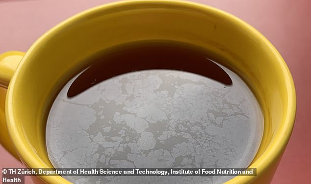 The shiny film on top of your tea is formed when biopolymers in the tea bond with the minerals in hard water. According to scientists, this may limit the amount of aroma that can escape the tea