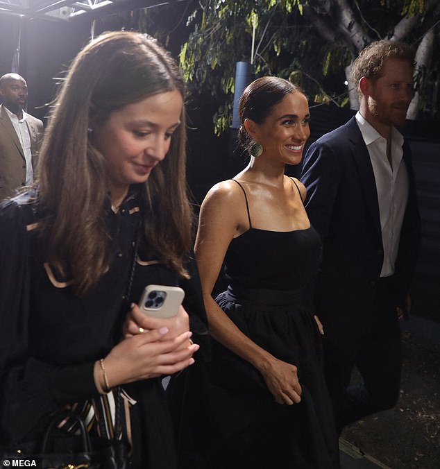 The Duchess of Sussex oozed glamour in a monochrome ensemble, which she looked to team with a simple body suit, on Tuesday evening