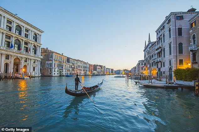 Venice (pictured) has recently tried to crack down on mass tourism by announcing plans to test a new day-tripper fee and new limits on the size of tourist groups