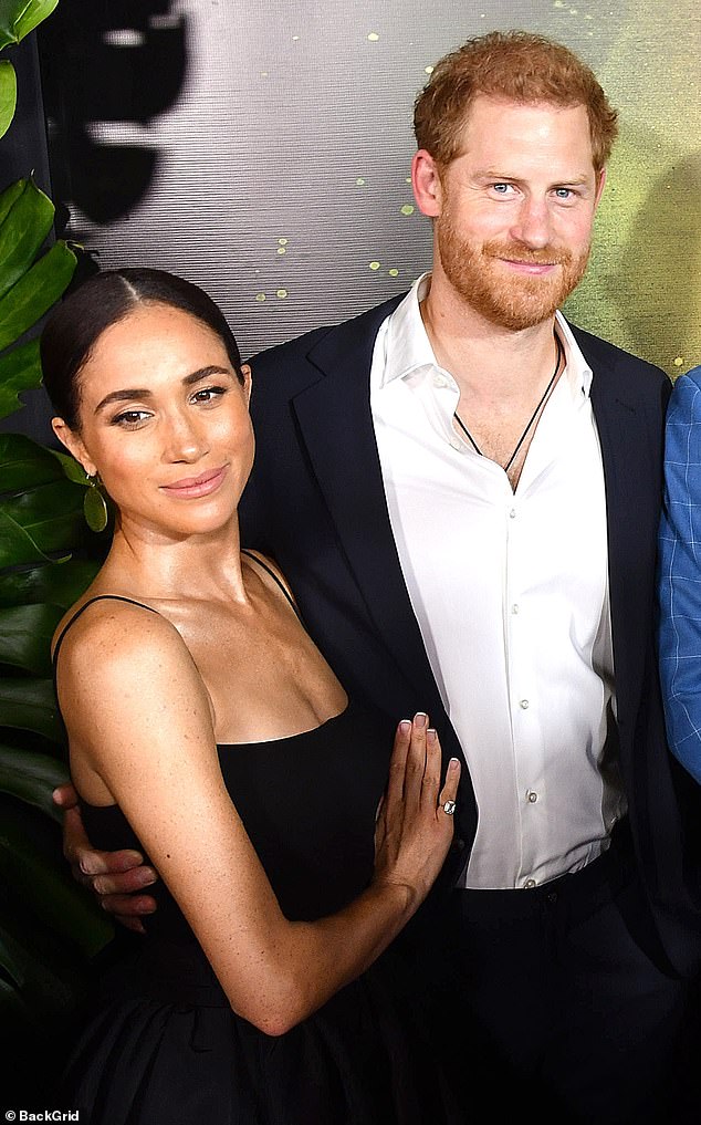 Last night Meghan Markle was the image of Hollywood glamour with a slicked-back bun and what fashion experts believe to be a bespoke, flowing maxi skirt from Carolina Herrera