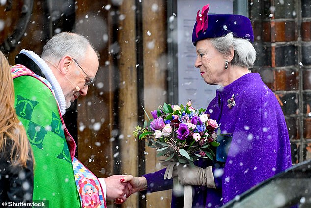Princess Benedikte of Denmark put on a glamorous display in a purple ensemble as she arrived at the Aarhus Cathedral