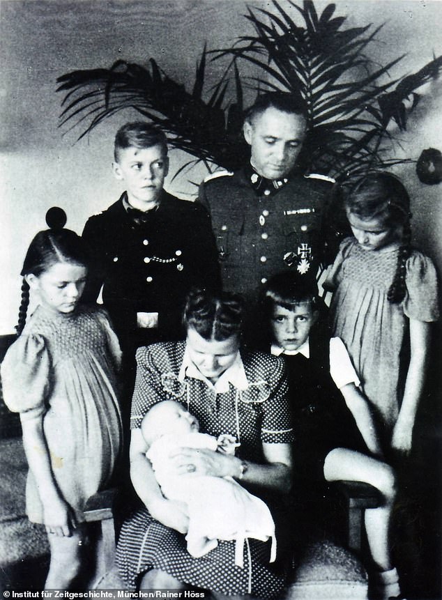 A new film by Jonathan Glazer explores the story of an Auschwitz commandant's time in Nazi-occupied Poland with his family, including the picnics they enjoyed at the local river. Pictured anti-clockwise from left: Inge-Brigit, Hedwig and Annagret, Hans-Jürgen, Heideraud, Rudolf and Klaus