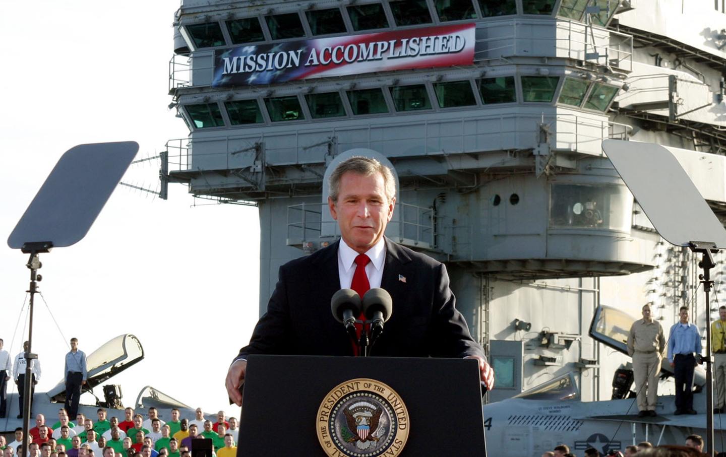 Banner „George Bush Mission erfüllt“.