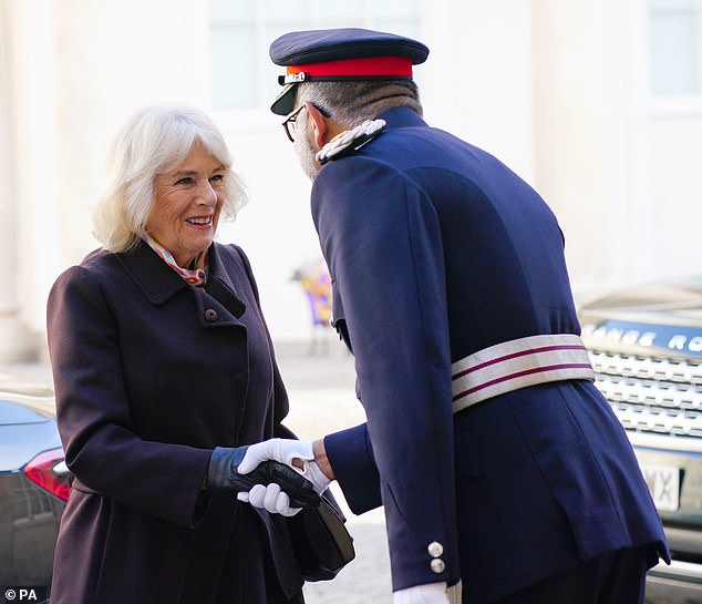 Queen Camilla is welcomed by Lord-Lieutenant of Somerset Mohammed Saddiq today