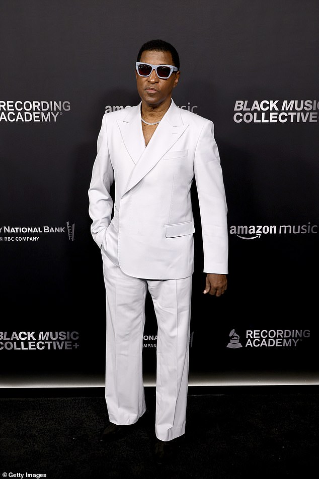 Babyface, 64, was handsome as ever in a light grey suit, under which he went shirtless, opting to wear just a stylish chain