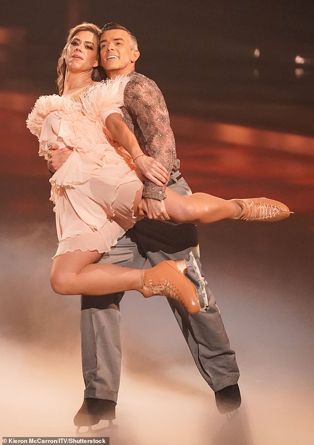 The soap star , 52, despite dislocating her rib during rehearsals had taken to the rink for a burlesque themed performance as she skated and sung live (Lou Sanders pictured)