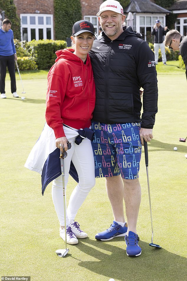 Zara and Mike Tindall appeared in high spirits as they showed off their putting skills during the rugby ace's star-studded charity golf day today
