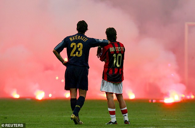 Marco Materazzi (left) will captain Italy, playing wiht Fabio Cannavaro and Francesco Totti