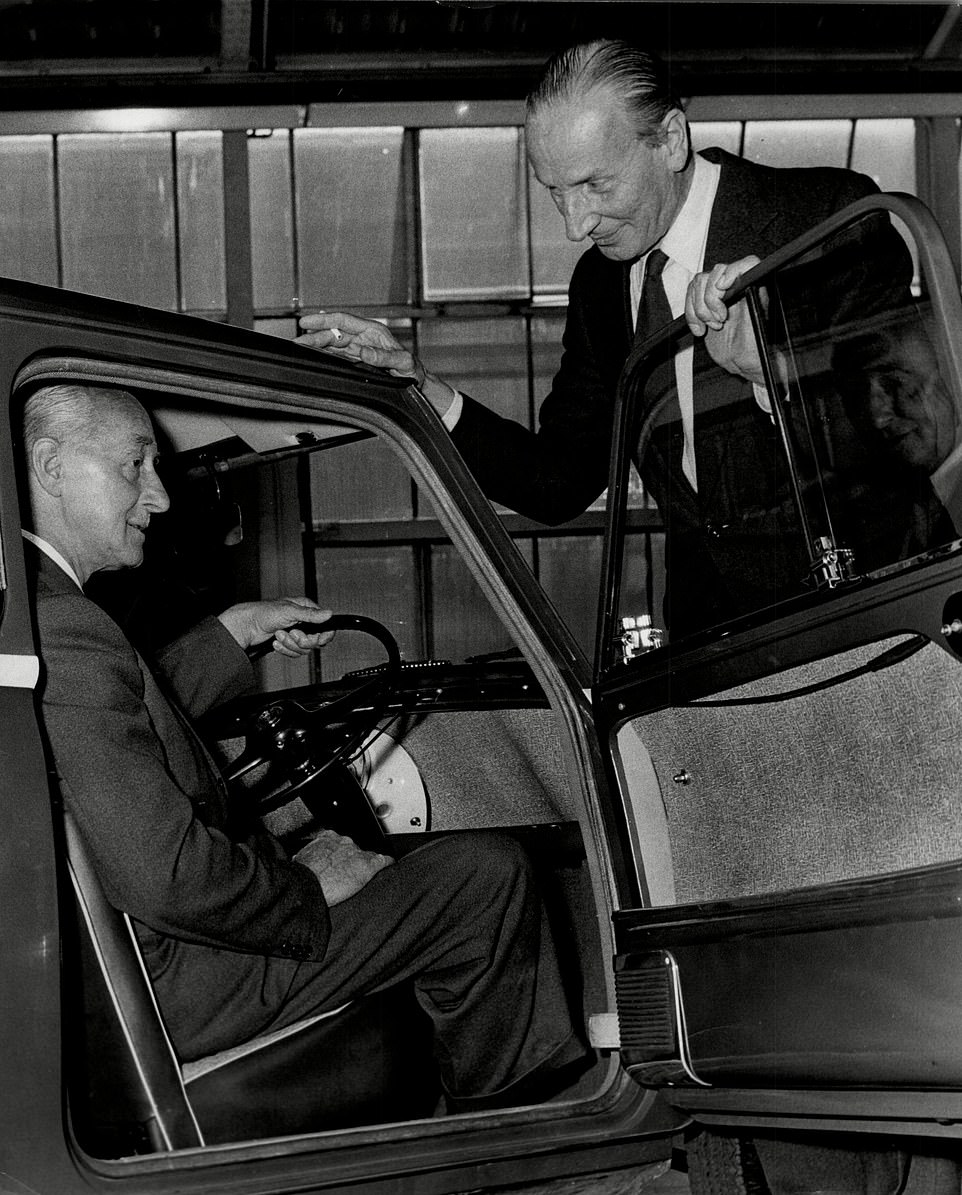 Sir Alec Issigonis with the new Austin Mini. He was commissioned to design the small car by BMC (British Motor Corporation) because of the fuel shortage caused by the 1959 Suez Crisis