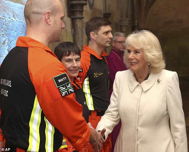 With the King out of action as he receives treatment, Camilla could take on more engagements (pictured greeted an air ambulance representative)