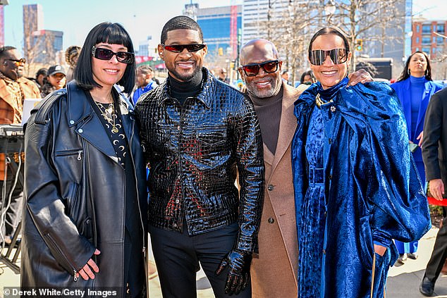 The newlyweds made sure to pose with three-time Grammy-winning songwriter L.A. Reid (2-R), who spoke at the event, and his second wife Erica Holton (R)