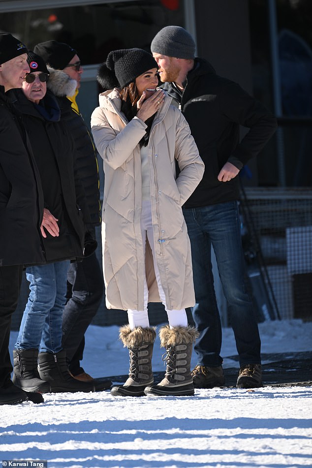 Meghan, 42, was clearly enjoying herself despite the temperatures which hovered around the freezing point