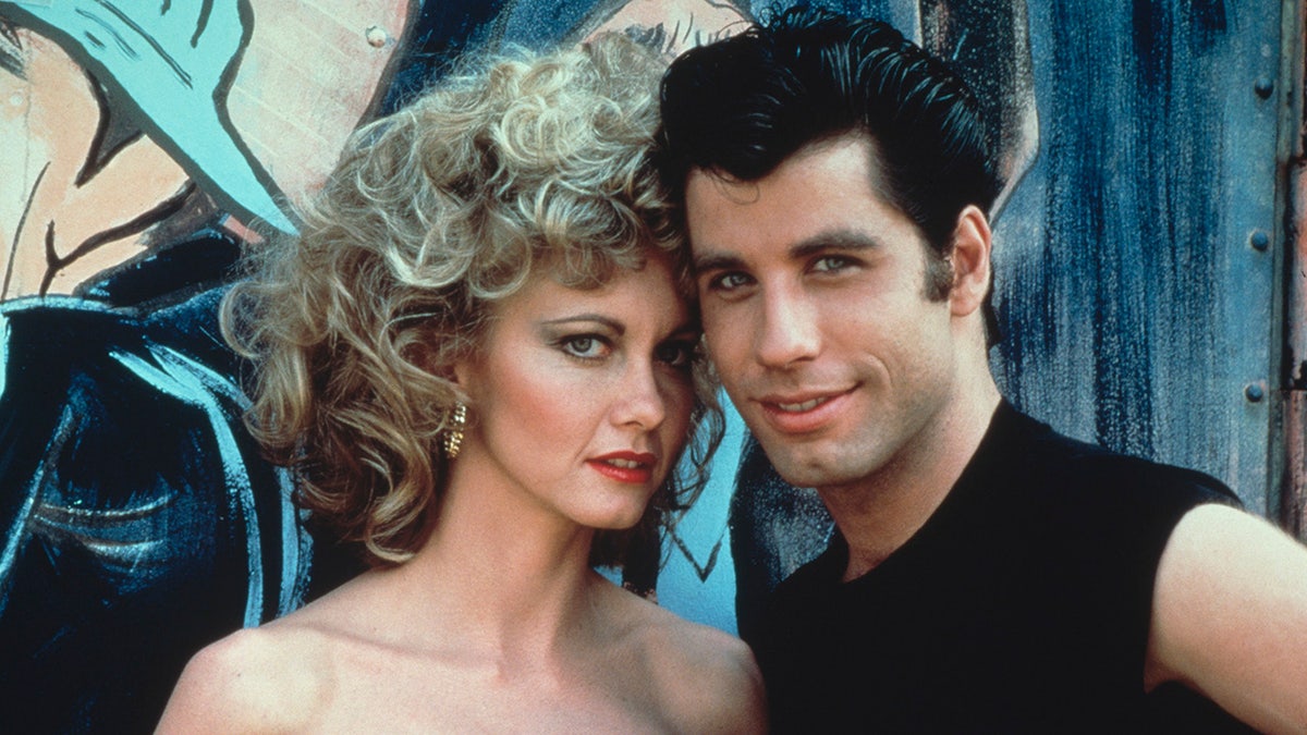 John Travolta und Olivia Newton-John als Sandy und Danny in Grease