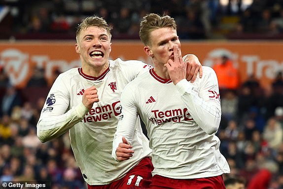BIRMINGHAM, ENGLAND - FEBRUARY 11: Scott McTominay of Manchester United celebrates scoring his side's second goal with team-mate Rasmus Hojlund during the Premier League match between Aston Villa and Manchester United at Villa Park on February 11, 2024 in Birmingham, England. (Photo by Chris Brunskill/Fantasista/Getty Images)