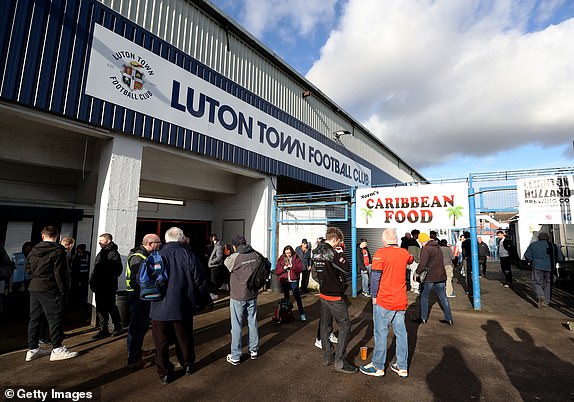 LUTON, ENGLAND - FEBRUARY 18: General view outside the stadium as fans arrive prior to the Premier League match between Luton Town and Manchester United at Kenilworth Road on February 18, 2024 in Luton, England. (Photo by Catherine Ivill/Getty Images)