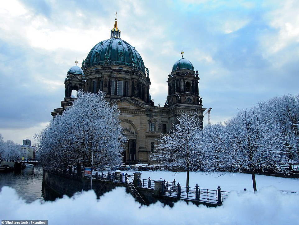 Here, the mighty Berlin Cathedral is surrounded by snow. According to exberliner.com, the German capital transforms in winter. The website says: 'When snow falls over Berlin... there is suddenly a magic about that place'