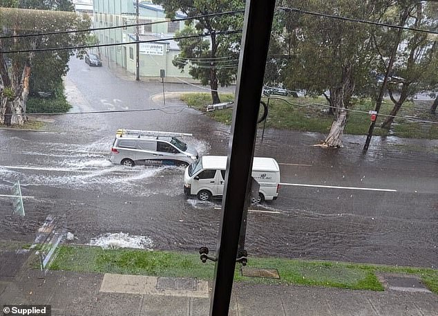 The city was lashed by a flurry of severe thunderstorms on Monday, causing heavy rain and more than 75,000 lightning strikes, with the wet conditions continuing into Tuesday (pictured, flooding in Alexandria on Tuesday)