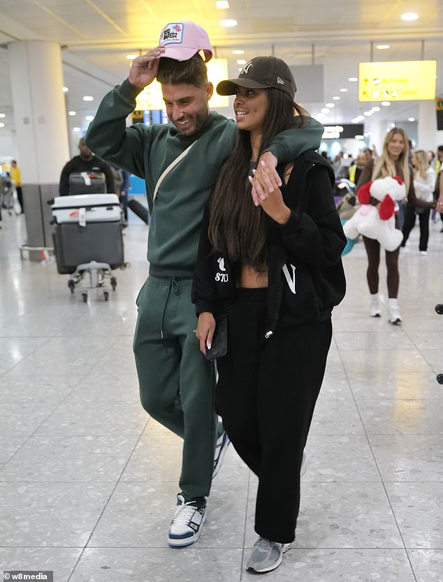 Sophie Piper and Joshua Ritchie were also seen landing at Heathrow with the rest of the group