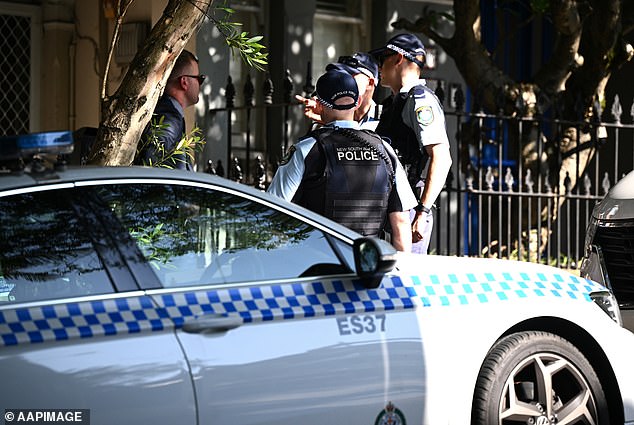 Police officers are seen outside former Channel 10 star Jesse Baird's home in Sydney