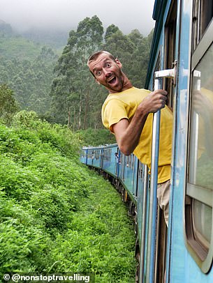 Craig pictured riding a train past the tea plantations in Ella, Sri Lanka