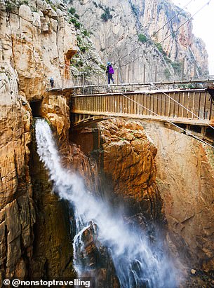 The couple hiking along the Caminito del Rey path in Spain