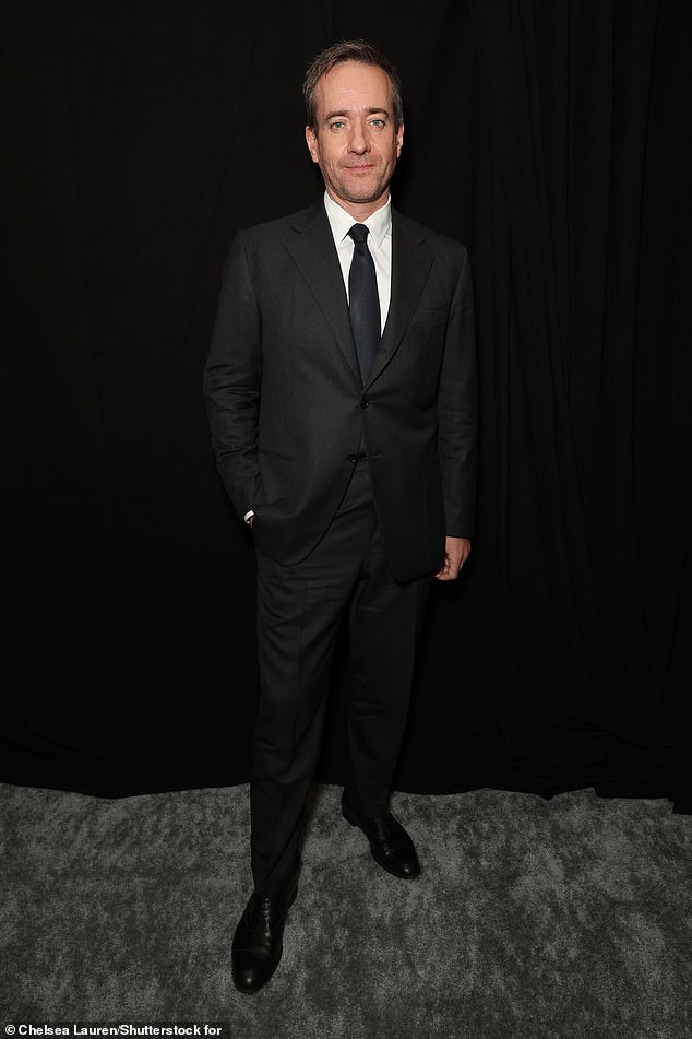 Macfadyen looked handsome in an all-black suit
